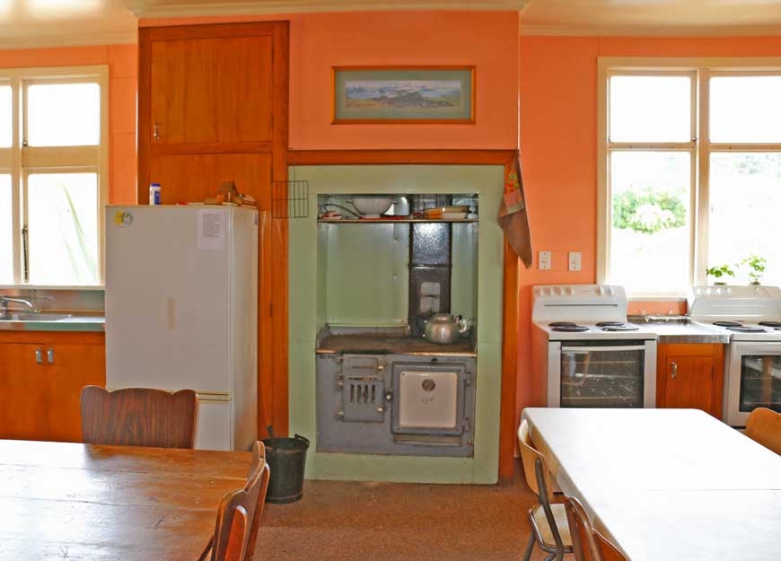 fully equipped kitchen and dining room